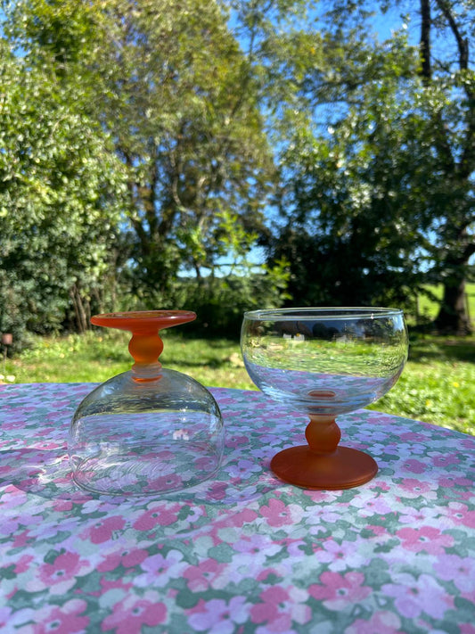 the orange glasses