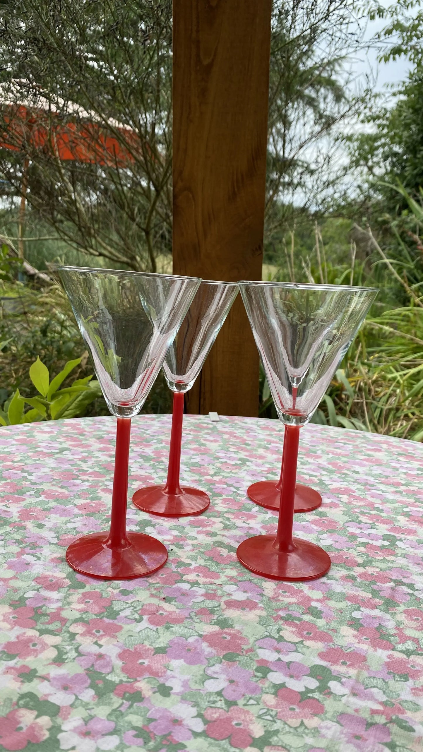 the red cocktail glasses