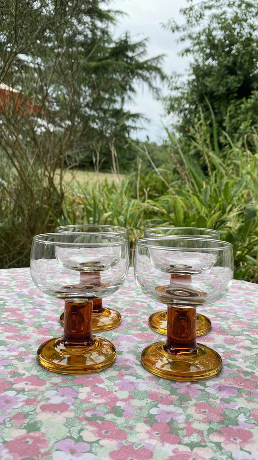 the brown glasses