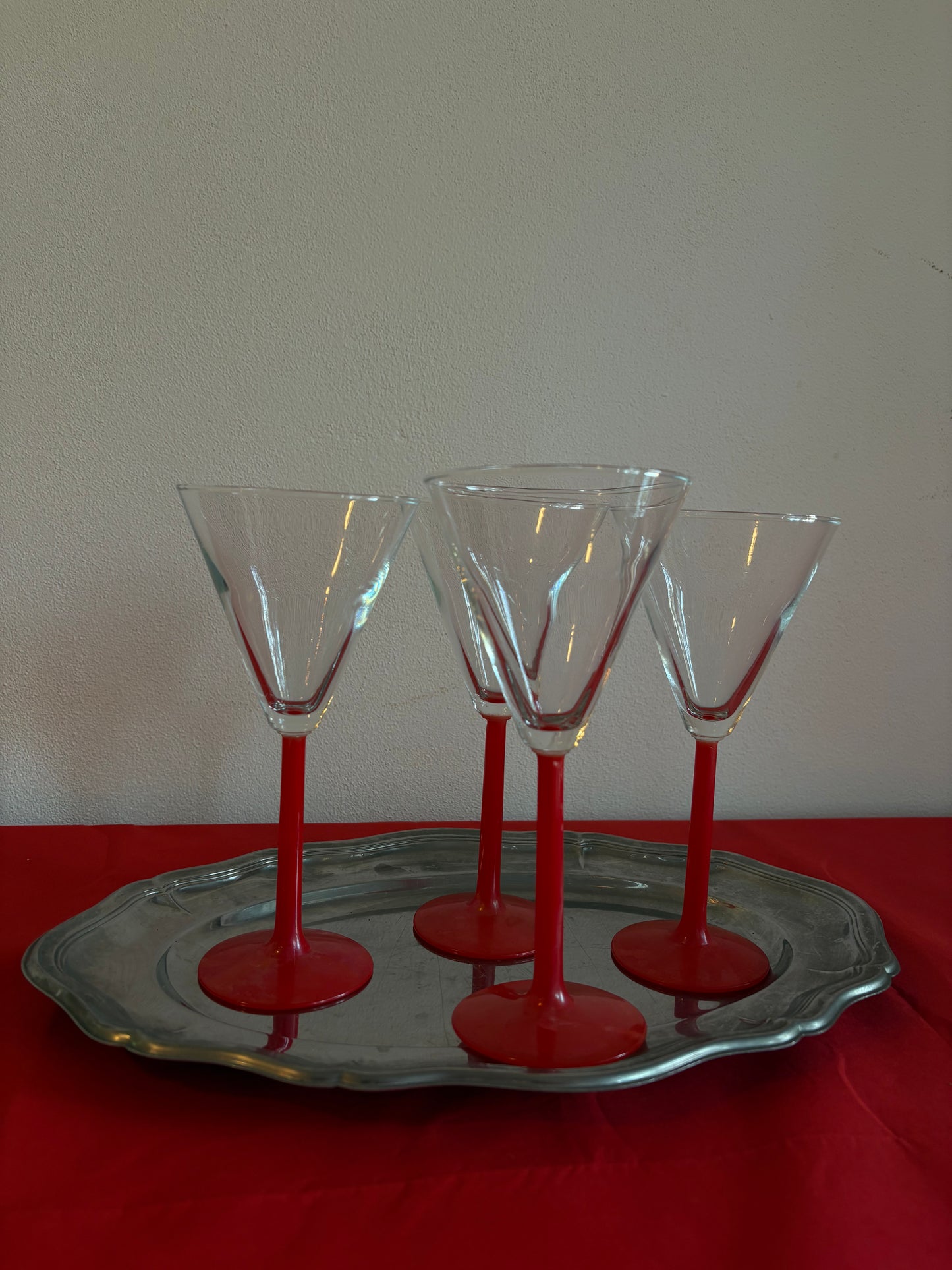 the red cocktail glasses